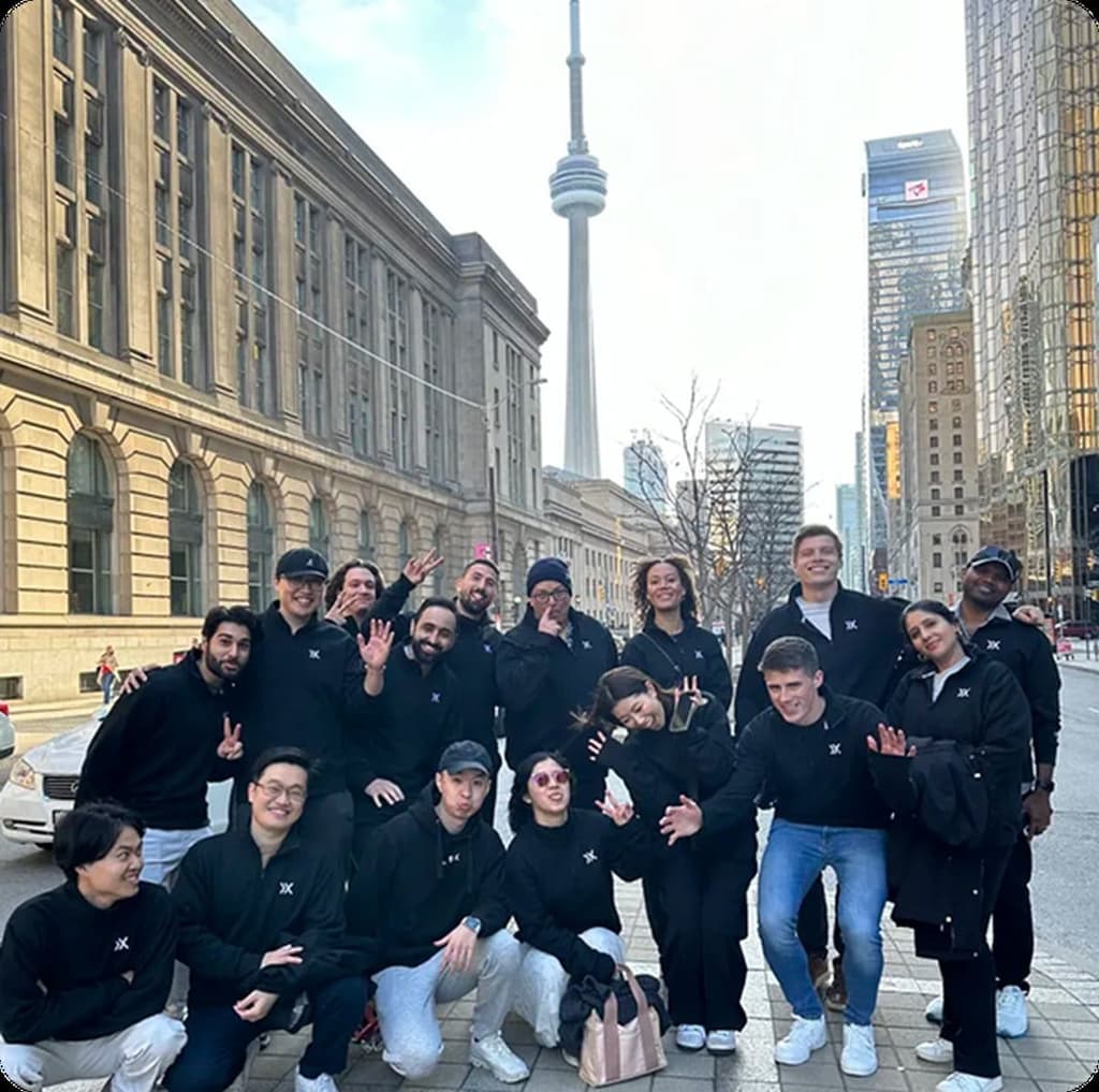 The small team behind the world's first AI form feedback system posing together in Toronto